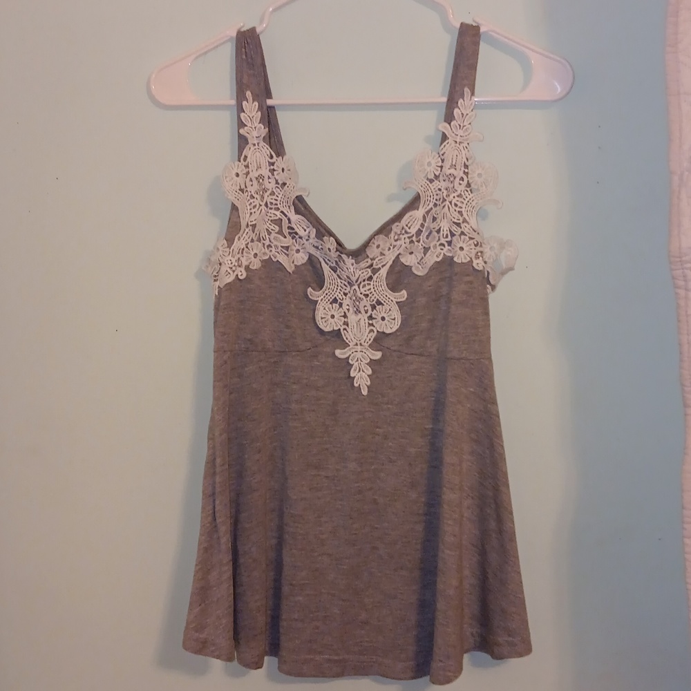 Gray and white floral neckline.